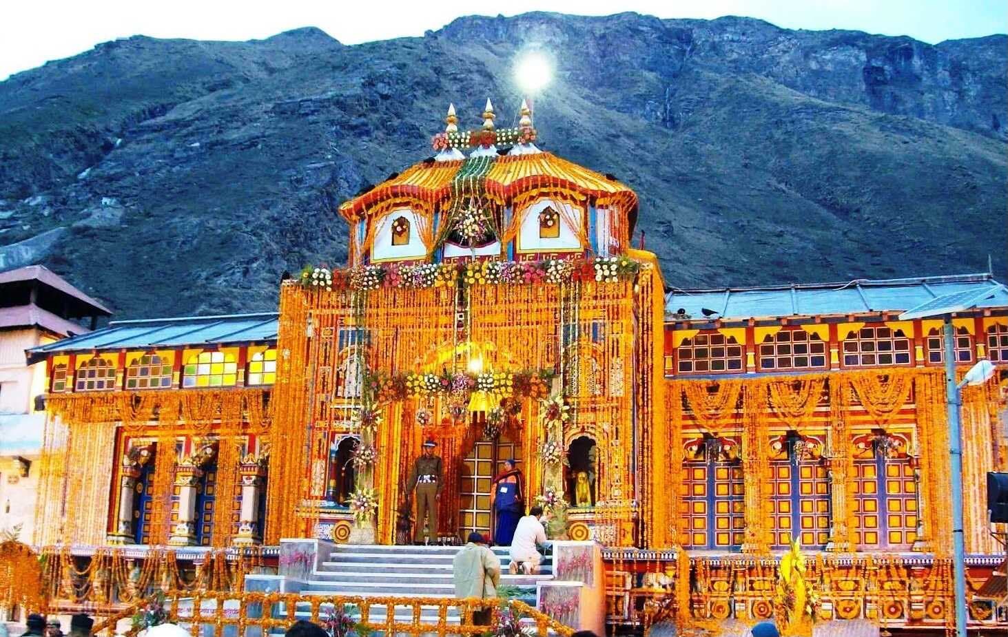 Colorful Badrinath temple with Neelkanth peak behind